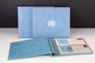 A collection of ten United Nations silver proof coin covers contained within three albums.