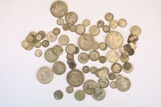 A collection of British pre decimal silver coins to include Crowns, half crowns, florins, threepence