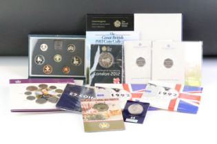 A collection of Royal Mint Uncirculated coin sets to include six year sets, £5 coins, 50p coins