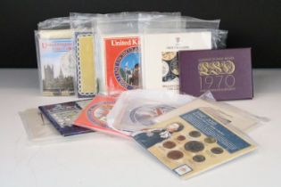 A collection of fifteen Royal Mint uncirculated coin year sets to include 1970, 1982, 1983, 1984,