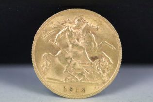 A British King George V 1914 gold half sovereign coin.