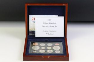 A Royal Mint United Kingdom 2005 Executive twelve coin proof set, set within wooden presentation