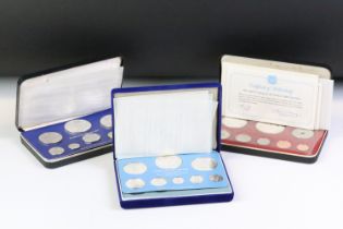 A collection of three Franklin Mint proof coin sets to include The first coinage of Papua New