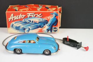 Boxed Gescha Auto Fox Nr 559 Porsche, mid blue body, plated trim, dog in window, control cable