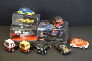 Collection of cased and unboxed Scalextric slot cars featuring 3 x cased slot car models featuring