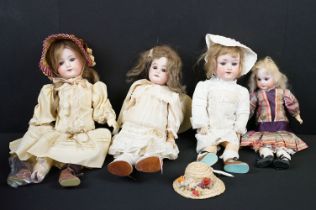 Four Armand Marseille bisque headed dolls in the form of girls. Three having sleeping eyes and