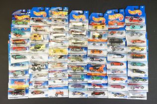 Around 69 carded Mattel Hot Wheels diecast models, appearing vg and some ex