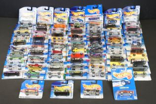 Around 80 carded Mattel Hot Wheels diecast models, appearing vg and some ex