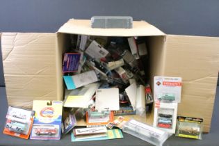 Large collection of boxed / carded HO/OO gauge plastic & diecast trackside model vehicles to include
