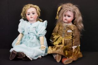 Two late 19th / early 20th Century bisque headed dolls with composite bodies, sleeping eyes, hand