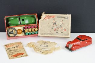 Boxed Schuco Telesteering Car set with green tin plate clockwork 3000 car, complete with accessories