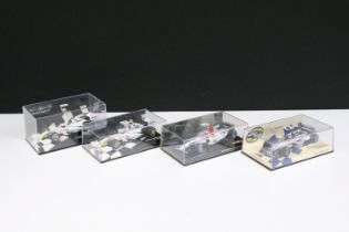 Collection of four boxed / cased Paul's Model Art Minichamps racing car diecast models to include