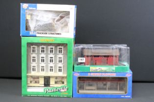 Four boxed O gauge trackside models to include 2 x Bachmann Plasticville (45315 Apartment Building &
