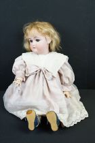 Early 20th Century Simon & Halbig Jutta bisque headed doll having sleeping eyes, teeth and hand