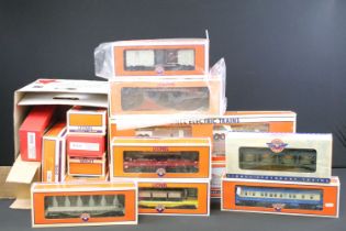 16 Boxed Lionel O gauge items of rolling stock to include 6-24152 #364 Conveyor Lumber Loader, 6-