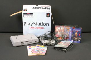 Retro Gaming - Boxed PS1 Play Station One with cables and relevant accessories, together with 4 x