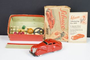 Boxed Schuco clockwork tin plate Telesteering Car 3000 in red with accessories and instructions,