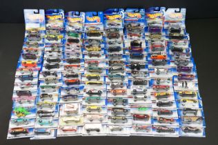 Around 130 carded Mattel Hot Wheels diecast models, appearing vg and some ex