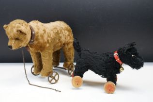 Two Early 20th Century Steiff pull along teddy bears on wheels to include Bear on Wheels, with