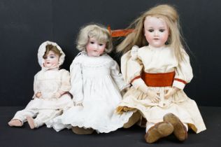 Three Armand Marseille early 20th Century bisque headed porcelain dolls. Two having sleeping eyes