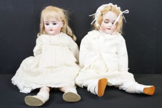 Two early 20th Century Simon & Halbig bisque headed child dolls, both having sleeping eyes, teeth