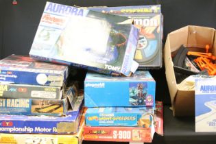 Collection of 11 boxed toys and games to include Tyco US 1 Electric Trucking Highway Construction
