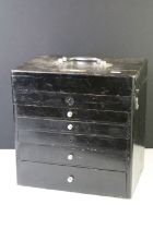 Early-to-mid 20th black painted wooden dentistry tool cabinet, with brass name plaque, the lid