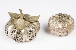 A vintage white metal betal nut holder in the form of a pumpkin with ornate pierced decoration