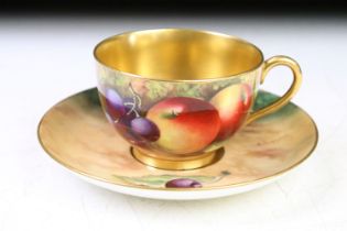Edward Townsend for Royal Worcester - A 20th Century cabinet cup & saucer with hand painted still