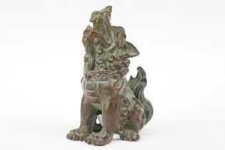 A Chinese bronze figural ornament of mythical Beast Qi Lin, stands approx 6.5cm in height.