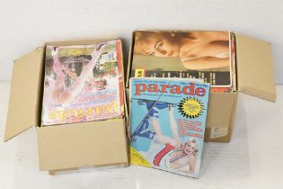 A large collection of vintage adult erotic magazines contained within two boxes.