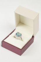 Silver CZ and Blue Topaz style Ring