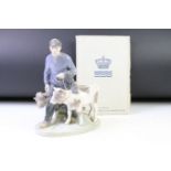 Royal Copenhagen porcelain figure group in modelled as a boy with two calves, numbered 1858,