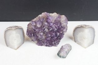 A collection of four amethyst crystal specimens to include a large rough cluster.