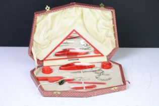 A mid 20th century cased vanity set in the Art Deco style, made in Sheffield, England.