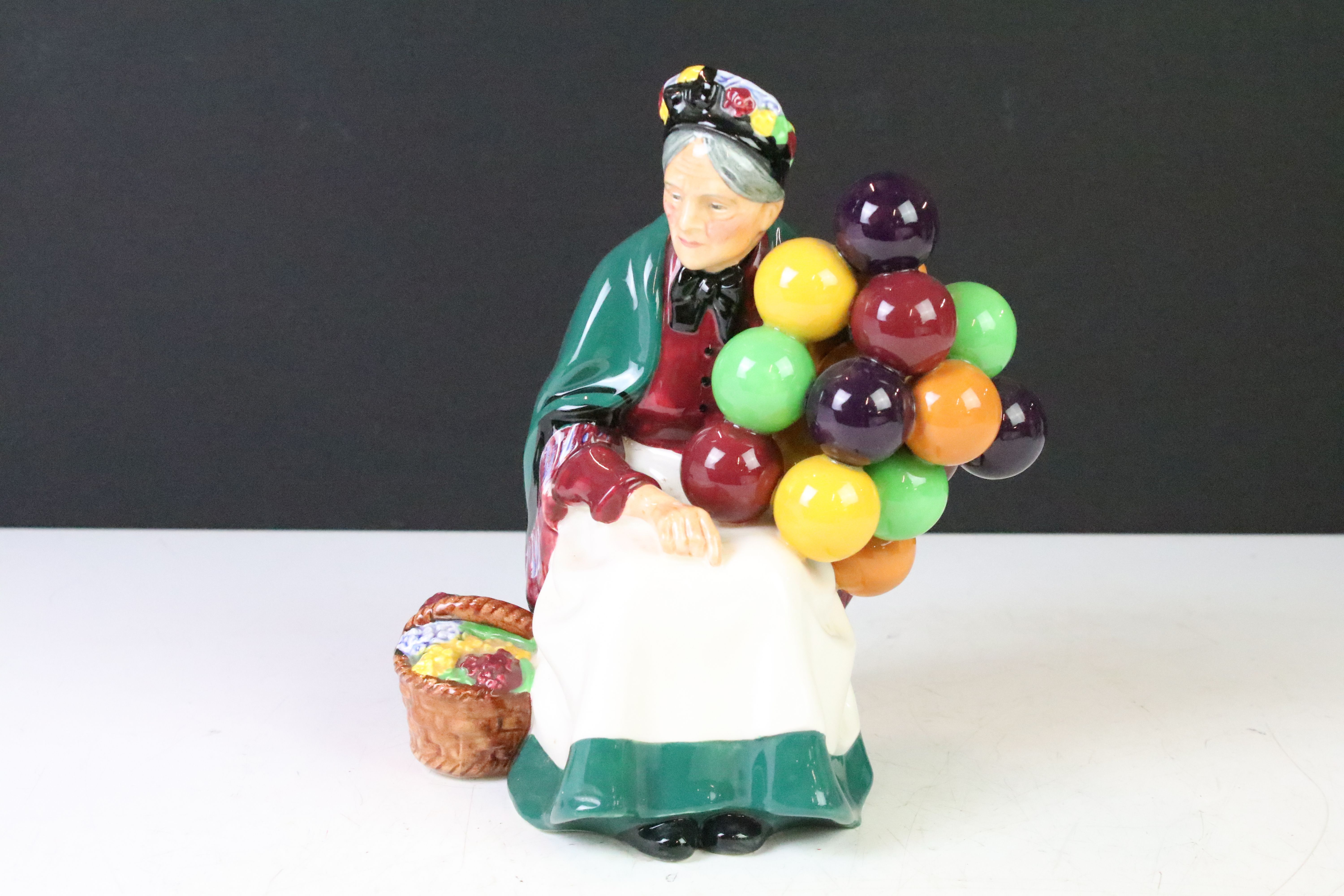 Four Royal Doulton porcelain figurines to include The Old Balloon Seller (HN1315), Autumn Breeze (HN - Image 9 of 18