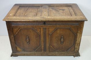 18th or 19th century Oak Coffer, the two panel front with moulded geometric design, 71cm high x