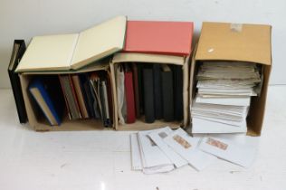 Collection of late 20th Century loose kilo ware stamps and two boxes of empty stamp albums.