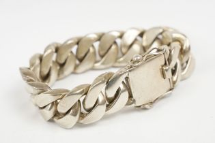 A 925 sterling silver large heavyweight solid link curb bracelet, overall length 22.5cm, link