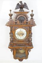 Late 19th / early 20th century Vienna walnut wall clock, the cream dial with Arabic numerals, with