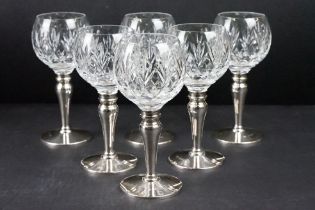 A set of six fully hallmarked sterling silver and cut glass goblets by Mappin & Webb.