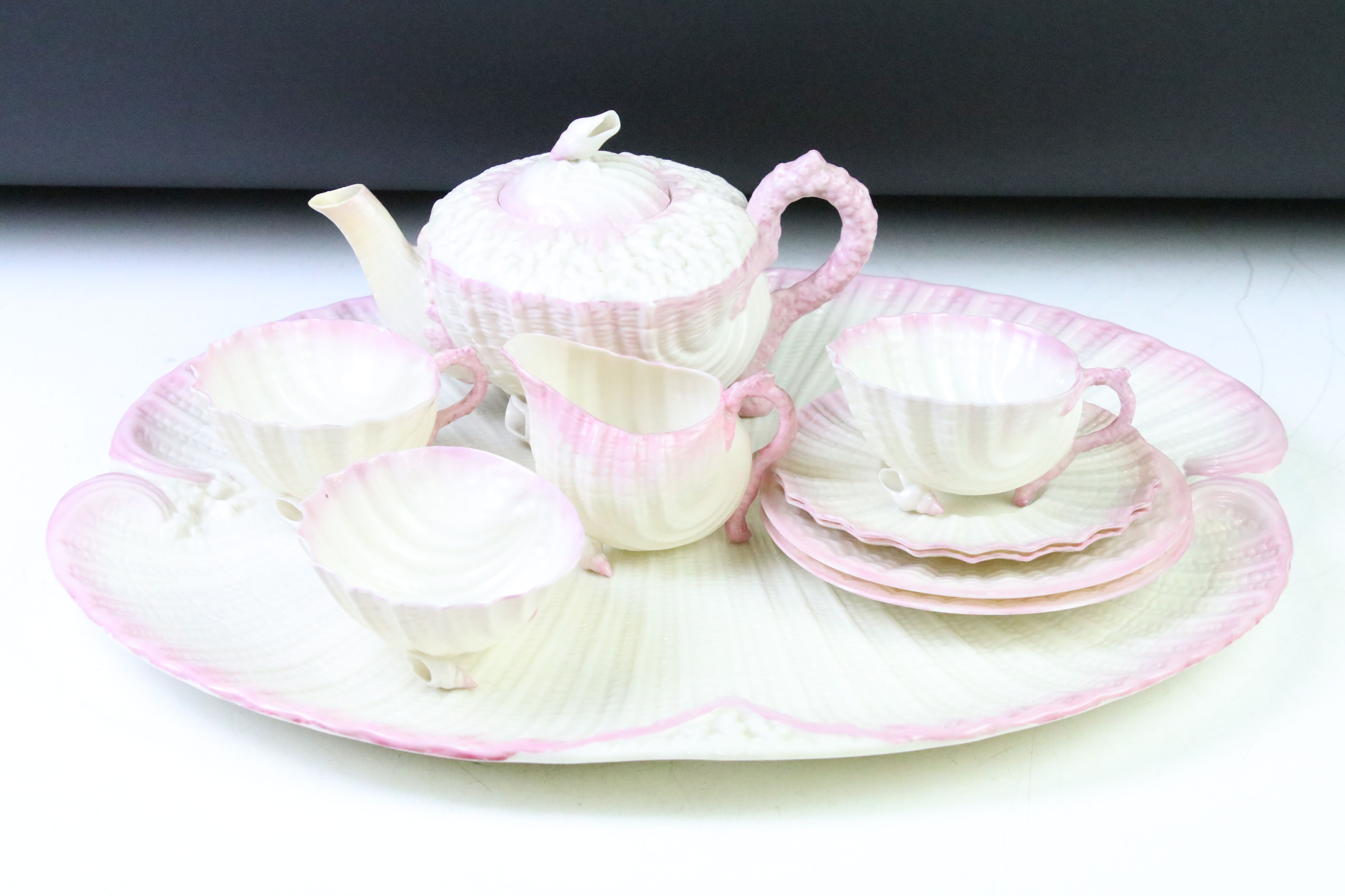 Late 19th / early 20th C Belleek Porcelain 'Neptune' pink shell pattern cabaret tea set for two,