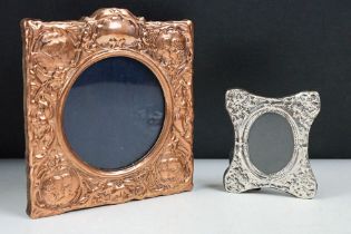 A hallmarked sterling silver easel back photograph frame together with a copper example with