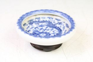 Chinese blue & white circular ink holder with underglaze blue decoration of a dragon, flaming