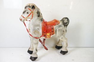 A vintage metal MOBO ride on hobby horse.