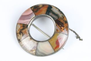 A Victorian Scottish silver and agate brooch of circular form with eight individual agate panels,