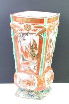 Japanese Kutani ceramic vase, decorated with four panels of men in traditional dress, with moulded