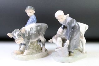 Two Royal Copenhagen porcelain figure groups, designed by Christian Thomsen, to include a girl and