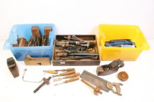 Collection of wood working tools to include a selection of moulding planes, planes, clamps, hand