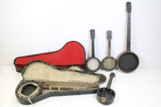 Collection of early to mid 20th Century banjo bodies of assorted sizes including two cased examples.